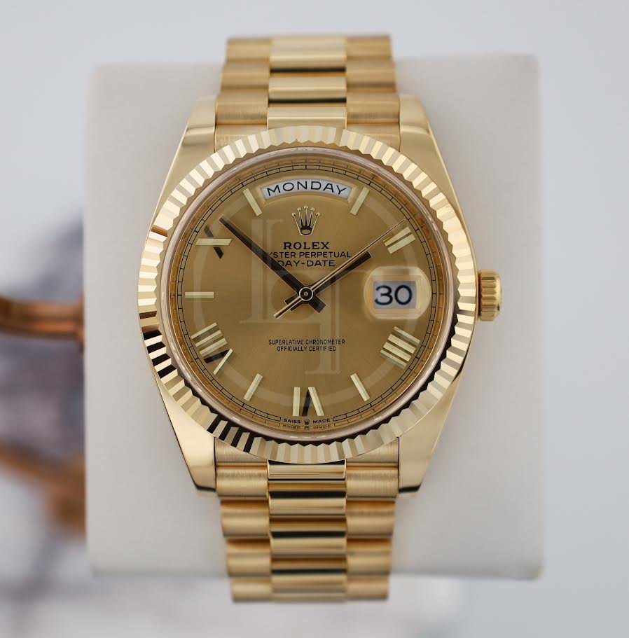 0_9a5a68de-0d4b-49aa-bc6a-686a9e7b8b0e.jpg Rolex Day-Date 40 Yellow Gold Champagne Roman Dial & Fluted Bezel President Bracelet 228238 - - Image 1